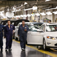 Workers walk the assembly line at Ford’s Chicago Assembly Plant on Aug. 4, 2009. The Chicago plant was the subject of a New York Times exposé into systemic racial and sexual abuse suffered by Ford’s female workers. (Scott Olson/Getty Images)